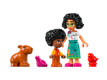 Load image into Gallery viewer, LEGO Encanto Antonio's Animal Sanctuary 43251 set featuring figures of Antonio and his mother with animal figurines