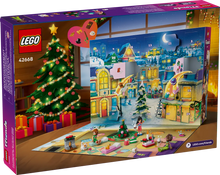 Load image into Gallery viewer, LEGO Friends Advent Calendar 2025 42668 box featuring festive scene with Christmas tree and decorated buildings