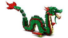 Load image into Gallery viewer, LEGO medieval dragon set featuring a detailed green and red dragon with articulated tail and fierce head design