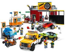 Load image into Gallery viewer, LEGO City Tuning Workshop set by Brick Shack featuring cars, workshop building, and minifigures in a detailed boxed set