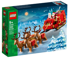 Load image into Gallery viewer, LEGO Santa's Sleigh set UK with Santa figure and four reindeer in a snowy Christmas scene