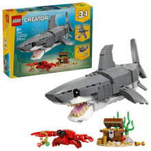 Load image into Gallery viewer, LEGO 31381: Creator 3-in-1: Fierce Shark with a Treasure Chest and crab figure, ideal for creative play.
