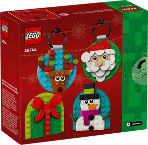 LEGO 40744 festive decorations boxed set featuring Santa, snowman, reindeer, and gift designs