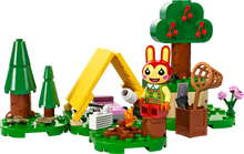 Load image into Gallery viewer, Animal Crossing LEGO camping set featuring character, tent, trees, campfire, and accessories
