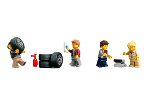 LEGO City Car Transporter minifigures repairing tyres and using tools from Brick Shack boxed set