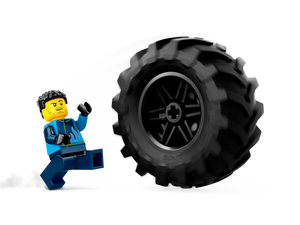 LEGO City Monster Truck set featuring a minifigure and large detailed monster truck tyre in action