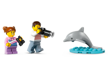 Load image into Gallery viewer, LEGO City sailboat set featuring minifigures with binoculars and camera observing a dolphin on a blue base
