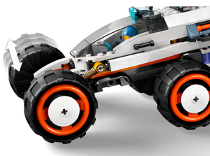 LEGO City Space Explorer Rover model with large black and orange wheels in action from Brick Shack
