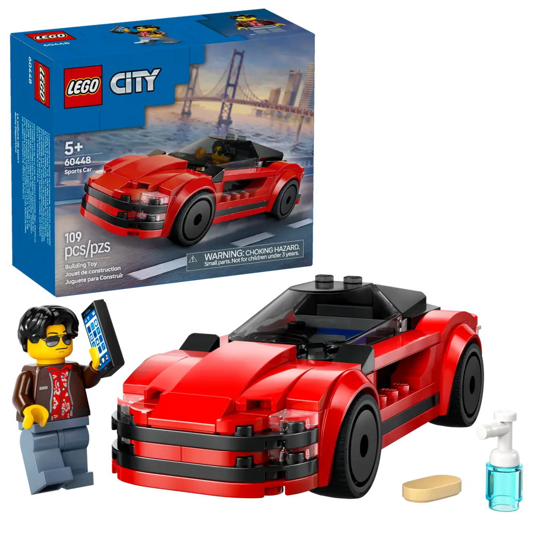 LEGO City sports car set with red convertible car and minifigure holding smartphone in boxed set