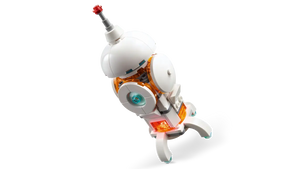 White and orange LEGO Creator 3-in-1 space robot model from Brick Shack boxed set