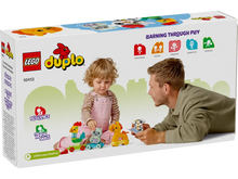 Load image into Gallery viewer, LEGO Duplo Animal Train set boxed set from Brick Shack with child and adult playing together
