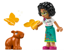 Load image into Gallery viewer, LEGO Encanto jewellery box figure with curly hair, green glasses, holding yellow butterflies near a small brown animal
