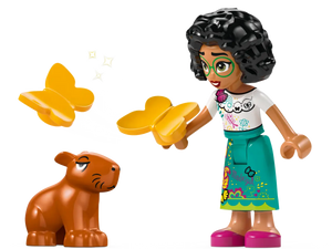 LEGO Encanto jewellery box figure with curly hair, green glasses, holding yellow butterflies near a small brown animal