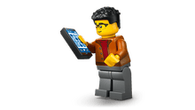 Load image into Gallery viewer, LEGO 60486 electric car set 60486 minifigure holding a smartphone and wearing a brown jacket

