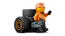 Load image into Gallery viewer, LEGO Boxed Set Brick Shack orange helmet racing driver minifigure with two black tyres
