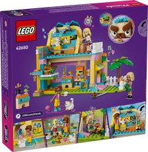 Load image into Gallery viewer, LEGO Friends Pet Accessories Shop set boxed set with colourful pet shop building and mini figures
