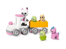 Load image into Gallery viewer, LEGO Gabby&#39;s Dollhouse Kitty Care set featuring a white and pink toy train with four colorful cat figures
