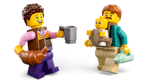 LEGO holiday camper van characters with a croissant, cup, baby, and bottle from Brick Shack boxed set