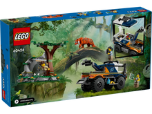 Load image into Gallery viewer, LEGO Jungle Explorer Off-Road Truck boxed set featuring a jungle scene with a tiger and minifigures
