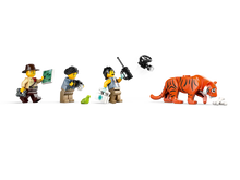 Load image into Gallery viewer, LEGO Jungle Explorer Off-Road Truck Boxed Set featuring explorers and a tiger figure
