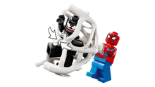 Load image into Gallery viewer, LEGO Spider-Man vs Venom set featuring Spider-Man trapping Venom in a white web on black background
