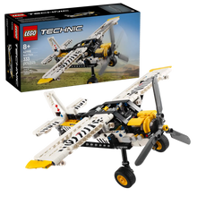 Load image into Gallery viewer, LEGO Technic bush plane set with detailed white and yellow model plane and packaging box on black background
