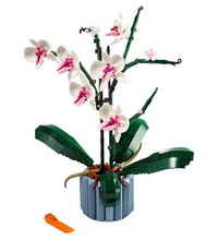 Load image into Gallery viewer, LEGO Botanical Orchid set 10311 featuring intricate flower details and lush green leaves in a decorative pot

