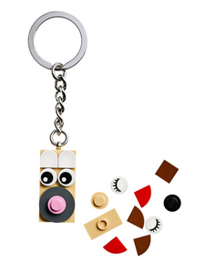 LEGO bag charm with cartoon face design and extra LEGO pieces for customisation